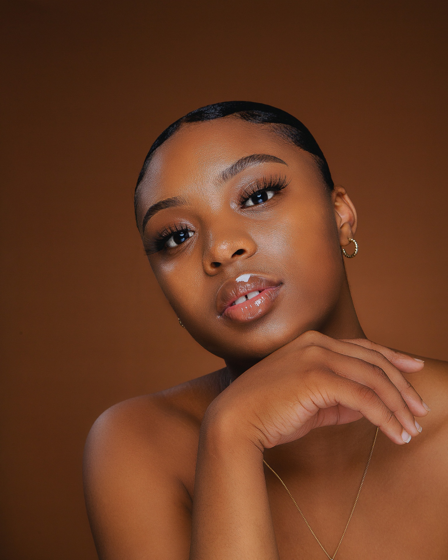 Photography portfolio cover — portrait and editorial imagery by Kay Mngomezulu